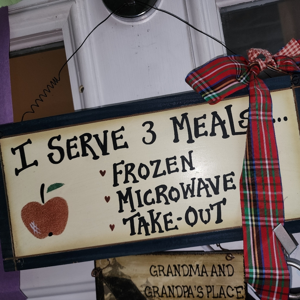 I serve three meals sign Frozen microwave takeout